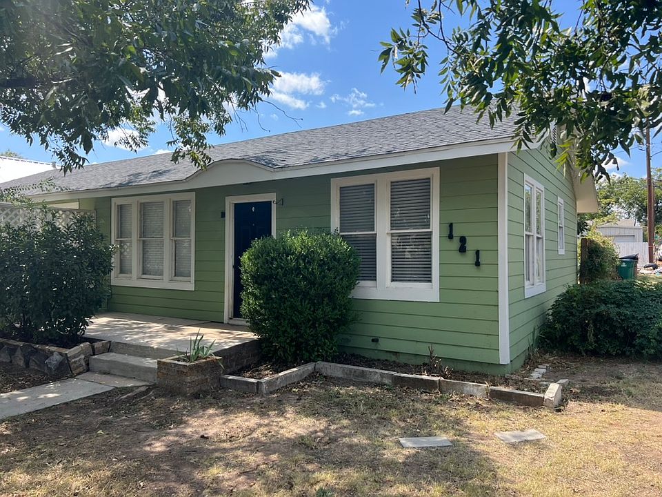 Duplex on corner lot with parking in the back