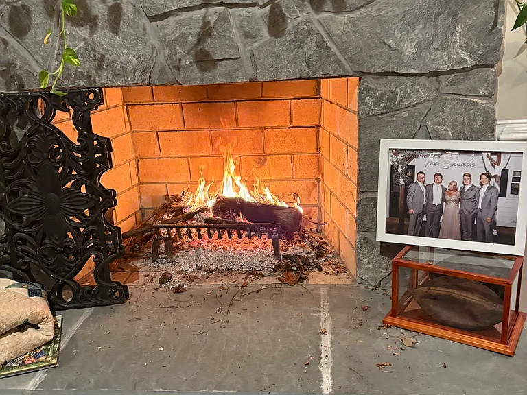 There is a real wood burning fireplace.