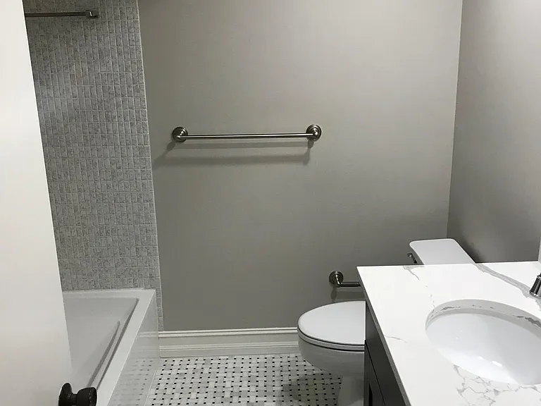 2nd Bath, new vanities, countertops, tile, faucet.