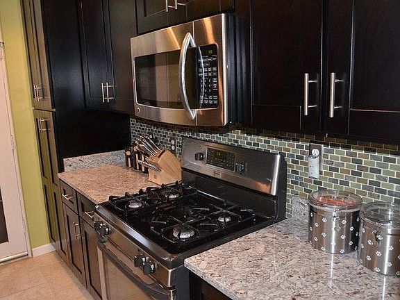 Renovated Kitchen with Granite and Stainless Steel