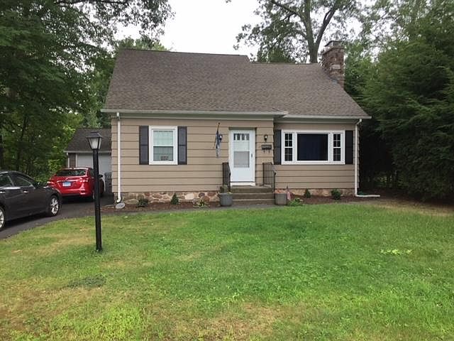 Front of home and one car garage. This home has a nice flat backyard suitable for playing, entertaining and gardening.