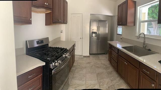 1st image of 8731 1/2 Holloway Dr