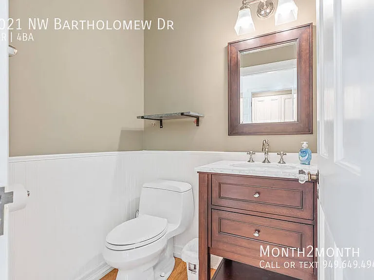 9021 NW Bartholomew Dr — Photo 27