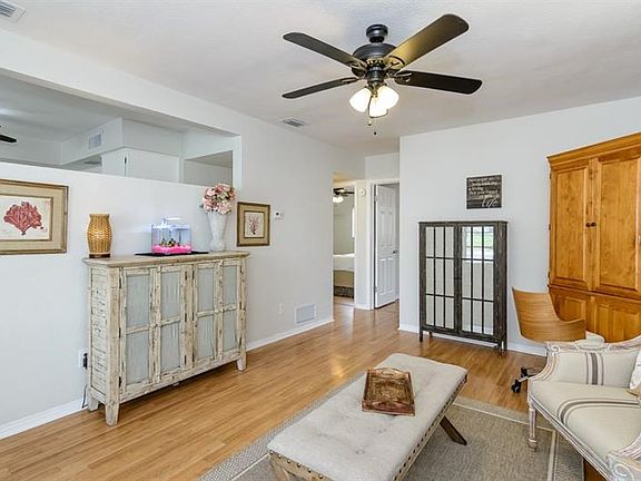 Enter into a Living Room Space Adaptable to Your Lifestyle (12.1' x 16.2').