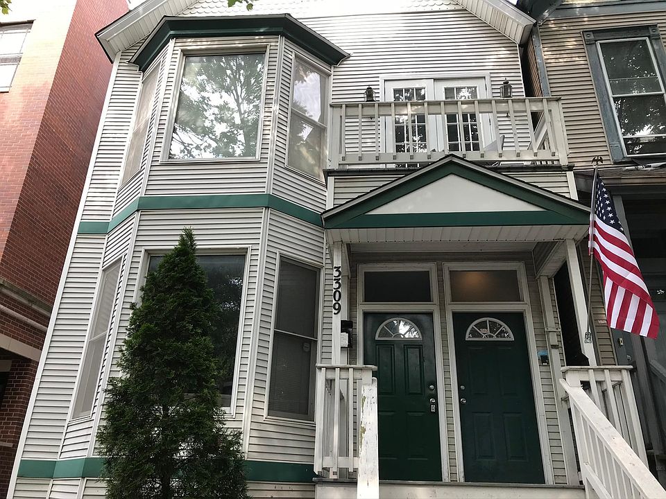 Front door to unit 1 on the left. Whole raised first floor is yours.