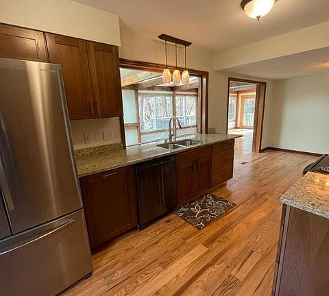 View of kitchen entering the driveway entrance