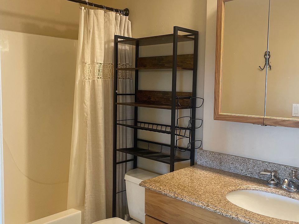 Bathroom with bathtub and shower