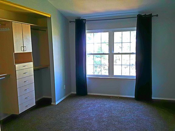 Beautiful master bedroom w/ vaulted ceiling, mountain views