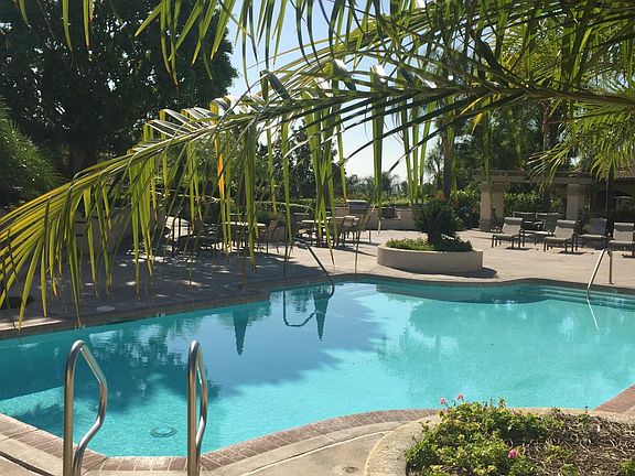 pool, steam room, pool table room, movie room, computer room, workout room, club house with kitchen. tennis court, exercise/ workout room