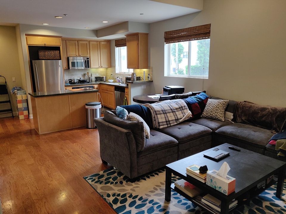First floor open kitchen + living room with vaulted ceilings!