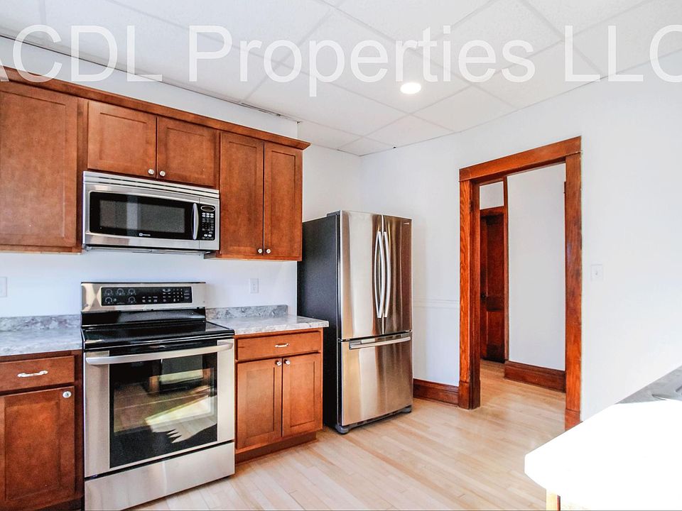 Updated kitchen includes stainless steel appliances, new cabinets, new countertops and walk-in pantry