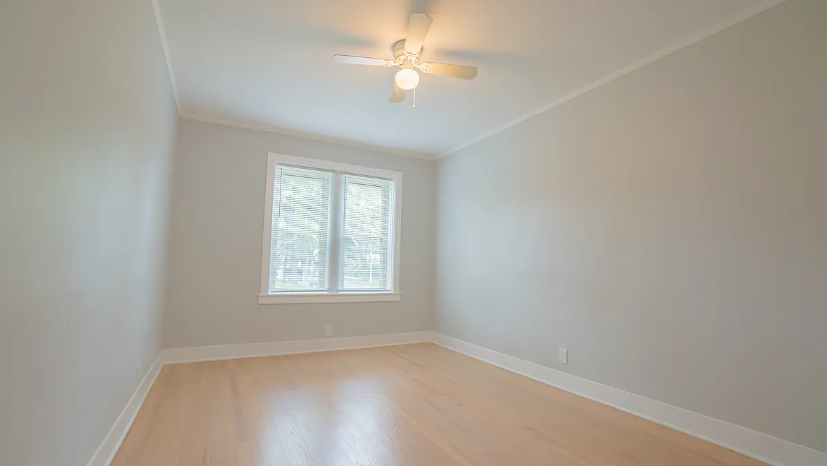 bedroom 1 with beautiful natural lighting - 5659 N Rockwell St #1