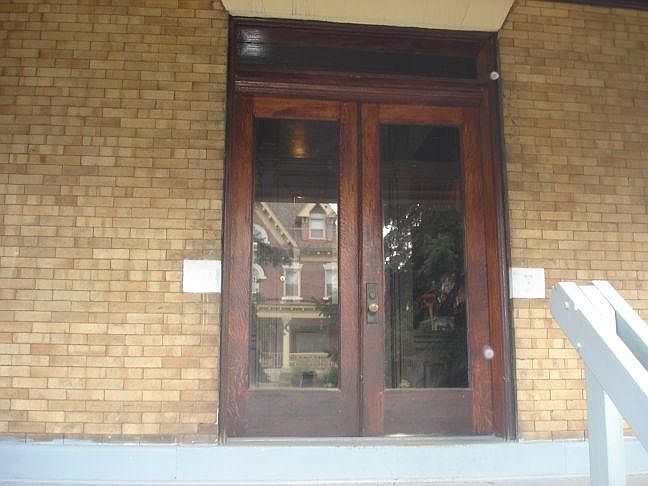 401 South Graham Street entry doors on porch.