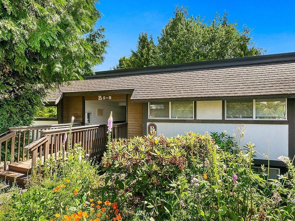 Upper level condo with reserved parking spot steps away from unit.