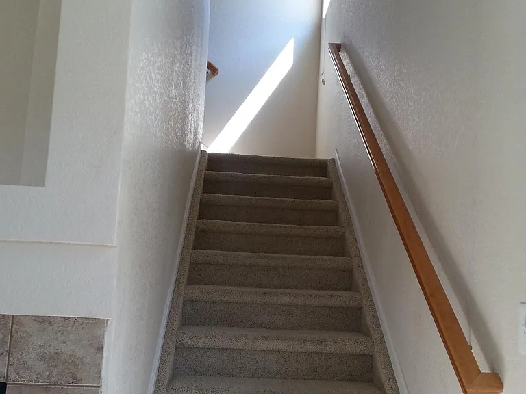 stairs up from living room