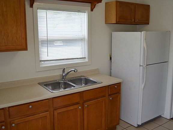 Kitchen with refrigerator