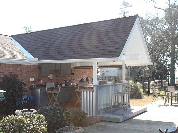 Outside Kitchen/deck
						:
						Big Green Egg & gas grill; sink/ refrigerator and plenty of storage