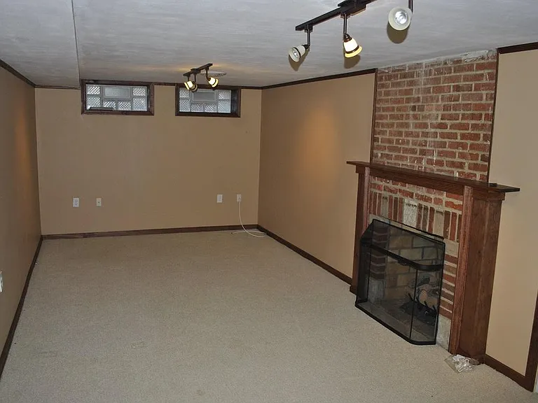 Finished basement (other half of basement is laundry facilit