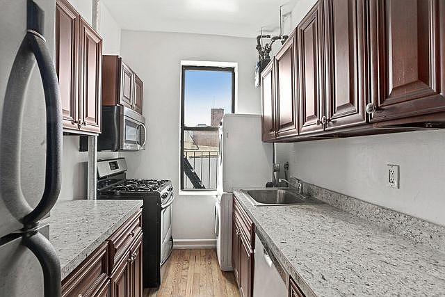 1st image of 401 W 47th St APT 14
