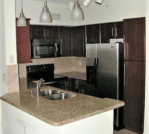 3rd image of 11661 W Atlantic Blvd #1008