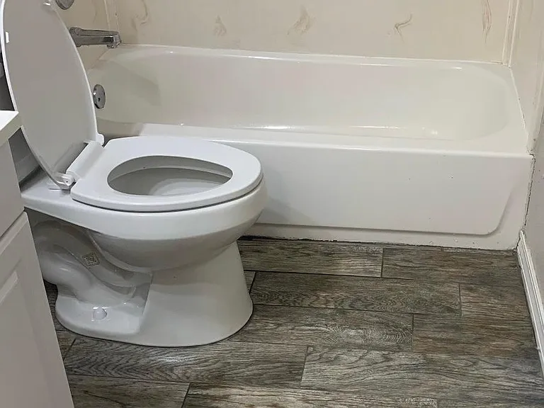 bathroom with new tile flooring