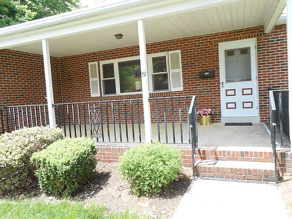 Notice the Large Front Porch with Shaded Roof