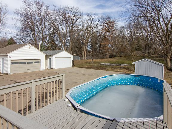 Back yard, pool, 2 garages