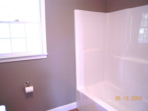 Awesome sparkling new bath tub.