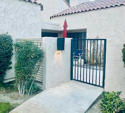 Entry through front gate.