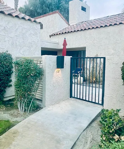 Entry through front gate.