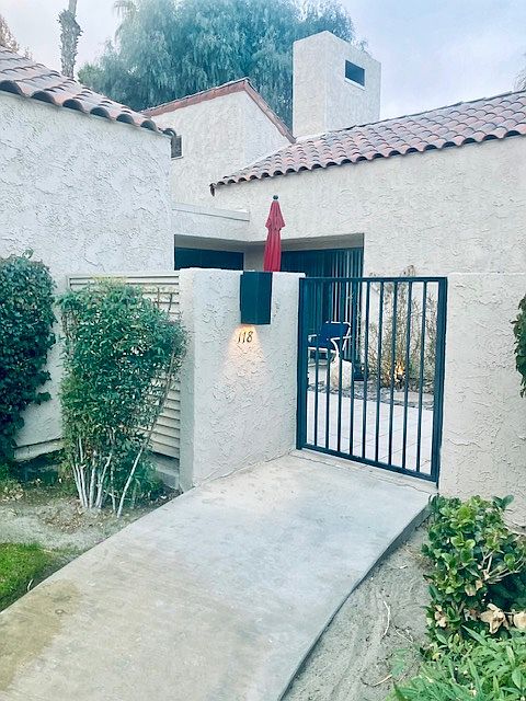 Entry through front gate.