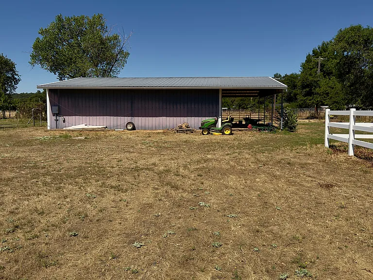 second electric RV hookup site and parking beside barn