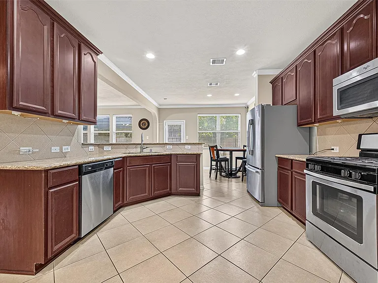 9106 Fuqua Breeze Dr — Photo 20