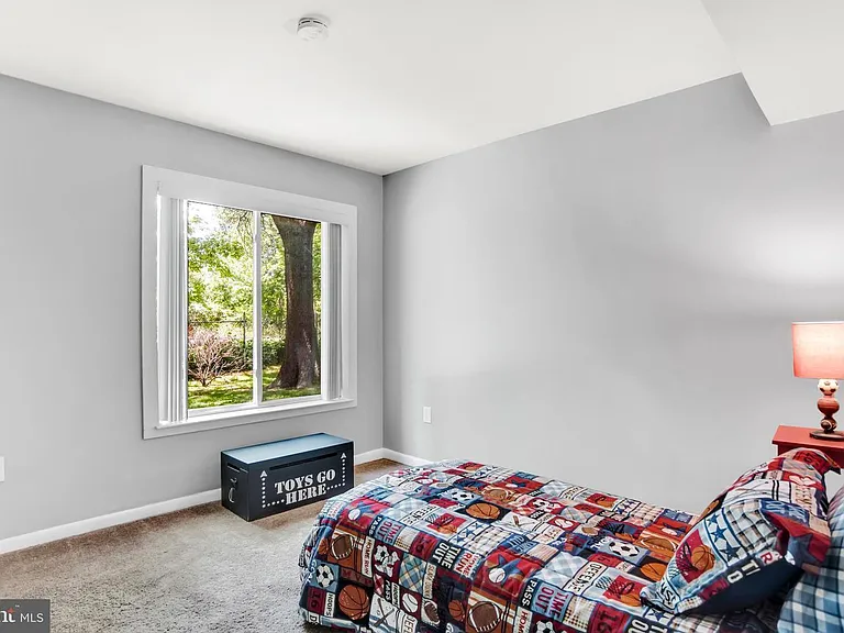 Bedroom #3. Carpet has been replaced with LVP flooring.