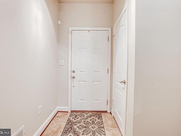 Bright entry with tiled floor