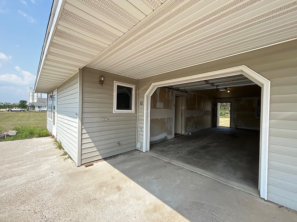Extra Deep (for storage) one car garage. Including service doors going into the back yard & laundry area inside the unit.