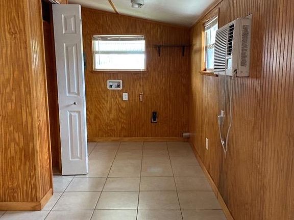 looking into laundry area from bedroom