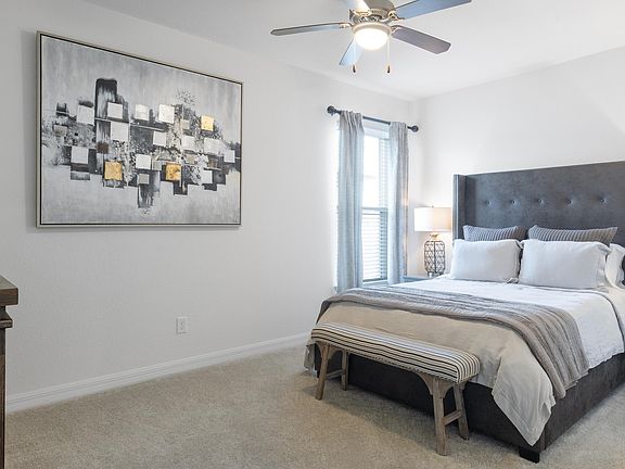 Experience tranquility in this elegantly designed bedroom, where comfort meets style.