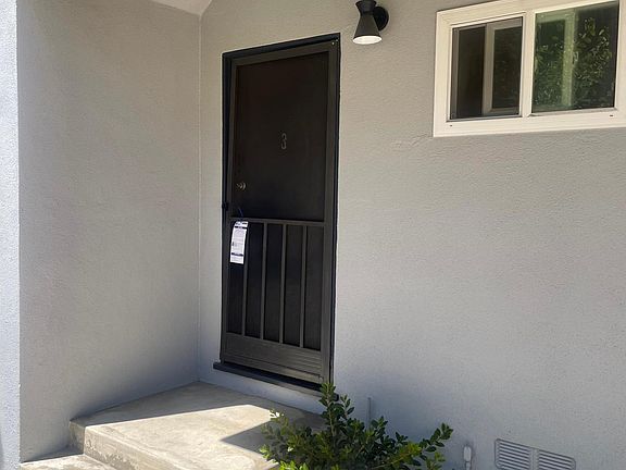 3rd image of 9460 Woodruff Ave APT 3