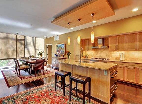 Light and bright, open floor plan.  Gorgeous hardwood floors throughout entire kitchen, dining and living area.