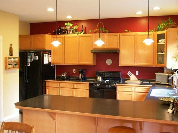 Beautiful open kitchen...just like the rest of the house "a surprise awaits you inside"...not a drive by!