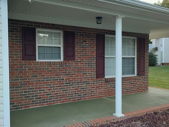 Covered porch near garage.