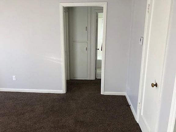 living room looking toward bathroom/bedrooms. hall storage.