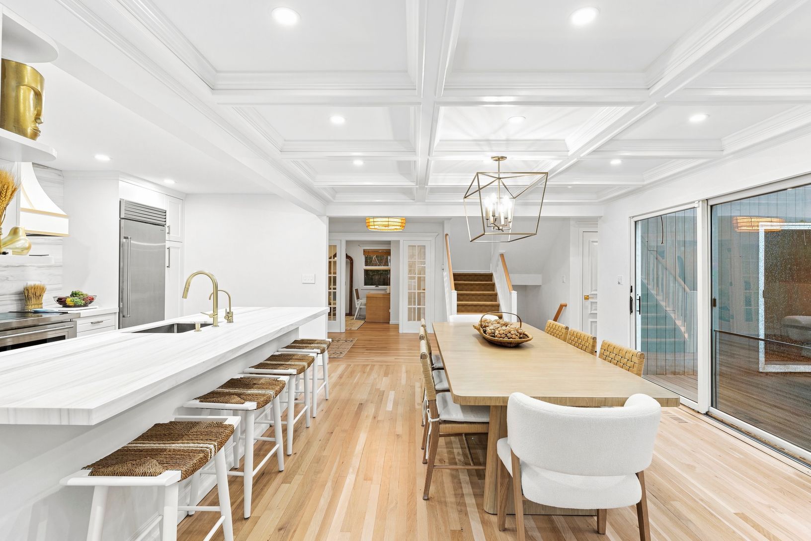  DINING WITH VIEW OF ENTRY FOYER LEADING TO OFFICE/DEN ETC