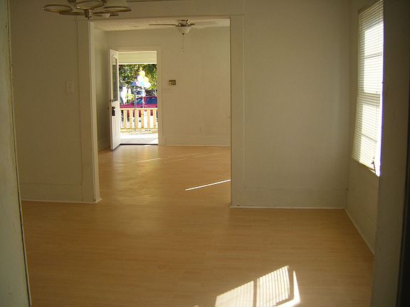 view from kitchen of dining and front livingroom