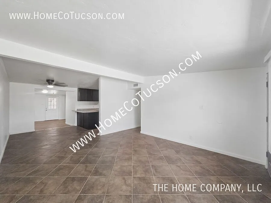 Spacious 5-Bedroom Brick Home with Large Fenced Yard | 6150 E 32nd St — Photo 4