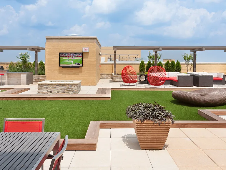 Grill Some Burgers and The Chill by The Fire Pit While You Catch a Game at The SkyClub