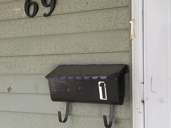 1st floor, 2nd door on right on porch