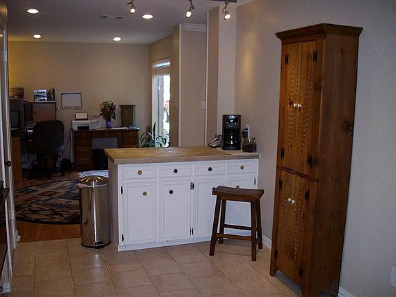  View from kitchen looking toward Dining Room which is currently being used as an office.