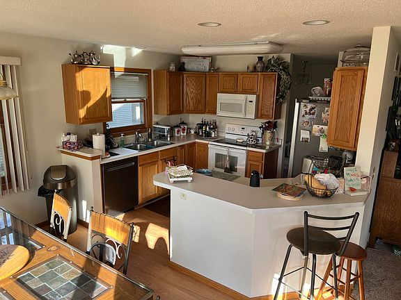 Beautiful kitchen with new dishwasher and new refridgerator. Includes Lazy Susan and pantry with pullout drawers!